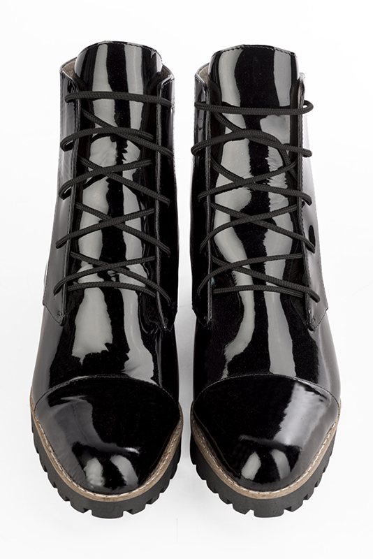 Women's gloss black elegant ankle boots, with laces at the front. Round toe. Thick rubber soles - Top view